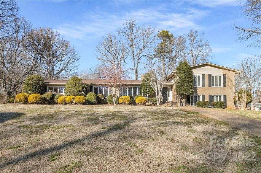 This Cherryville tri-level home offers an in-ground pool, and a patio.