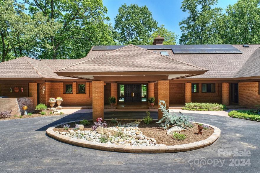 A well crafted true Masterpiece that seamlessly blends traditional aesthetics with modern design elements. Steel beams and poured concrete decks provide a solid foundation, while echoing and integrating nature with structure. From the inviting Grand entrance to the meticulously designed interiors, every detail exudes warmth and sophistication, inviting you to embrace the essence of Southern living at its finest.There are 17 exit doors throughout with each room having its own door to the outdoors, and each bedroom has a covered terrace.The home is constructed mainly with concrete and brick, ensuring stability, safety, and security, and the round bricks were custom made for the property.The Main floor is just shy of 5,000 square feet. Primary Suite include His/Her Private En-suites both with separate custom designer dressing room, and walk-in closets. The home is in the prestigious Cramer Mountain Golf and Country Club, and conveniently located to Restaurants, shopping, and Charlotte.