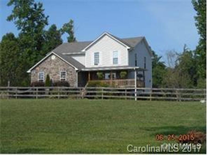 This one has it all.  Bring the horses!  Great neighborhood in quaint Landrum, a great commute location near I-26.  4 bedroom, 3.5 bath, large country kitchen with hardwood and tile floors and unfinished walk-out basement.  Two master bedrooms  (1 on each floor) Large deck with AG Pool, 3-stall barn, pasture and fencing.  Great storage space.