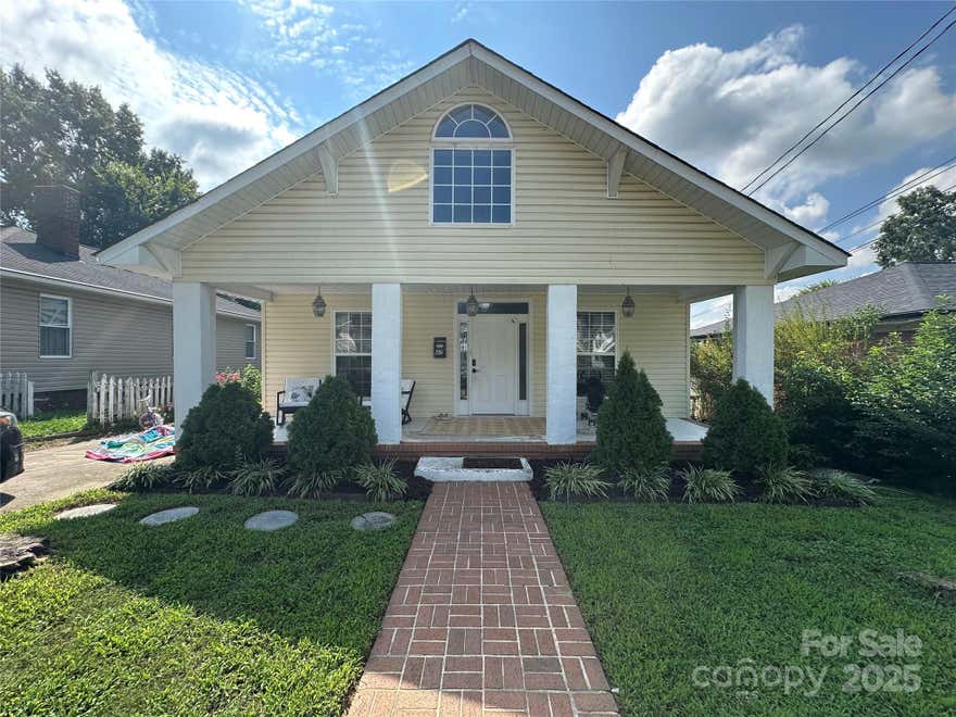 Welcome to this charming home near the heart of Concord! Laminate floors and ceramic tile are featured throughout the first floor, which includes a spacious kitchen with numerous cabinets. The living room has a decorative fireplace for looks only. Nice-sized dining room with the primary bedroom and  2nd bedroom on the main level. The bonus room upstairs is the perfect size for a playroom or this area could be used as storage. Very large backyard with bamboo to provide extra privacy. Enjoy your morning coffee on the oversized front porch.
