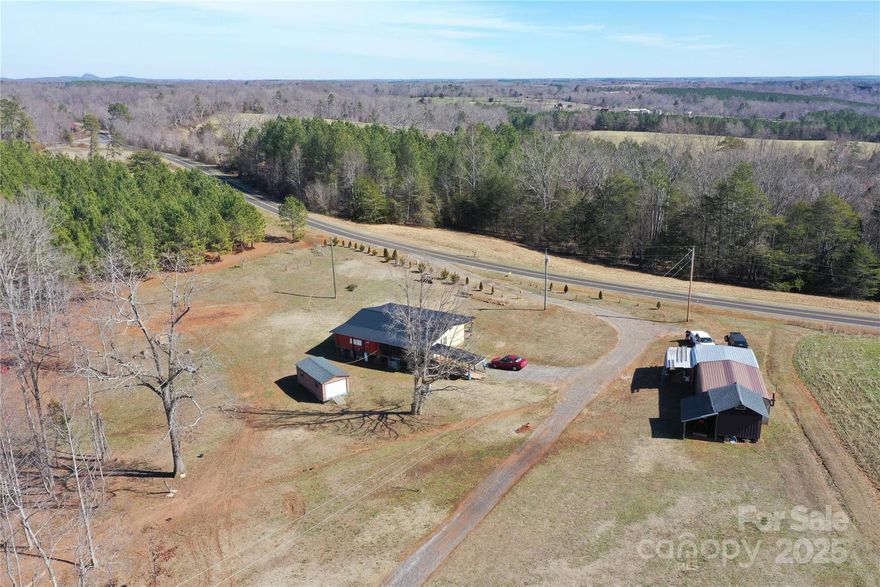 Located in Upper Cleveland County, this property offers an exceptional opportunity for anyone looking to build a mini farm or create a peaceful homestead in a private location. The property features a blend of timber and tillable land, giving you versatile options for agriculture, farming, or recreation. The current setup includes a 3-bedroom, 2-bath mobile home providing immediate comfort, along with two storage buildings for all your tools, equipment, or extra space needs. There are two septic systems already in place, along with county water.  No neighbors can be seen from the property. An additional level, second building site with long-range views of South Mountain is located at the high point on the property. Power and septic are in place at the mobile home location and the second building site. The current owner has a rich history of deer harvested on this property.  Other wildlife including turkey and rabbit frequent the land.