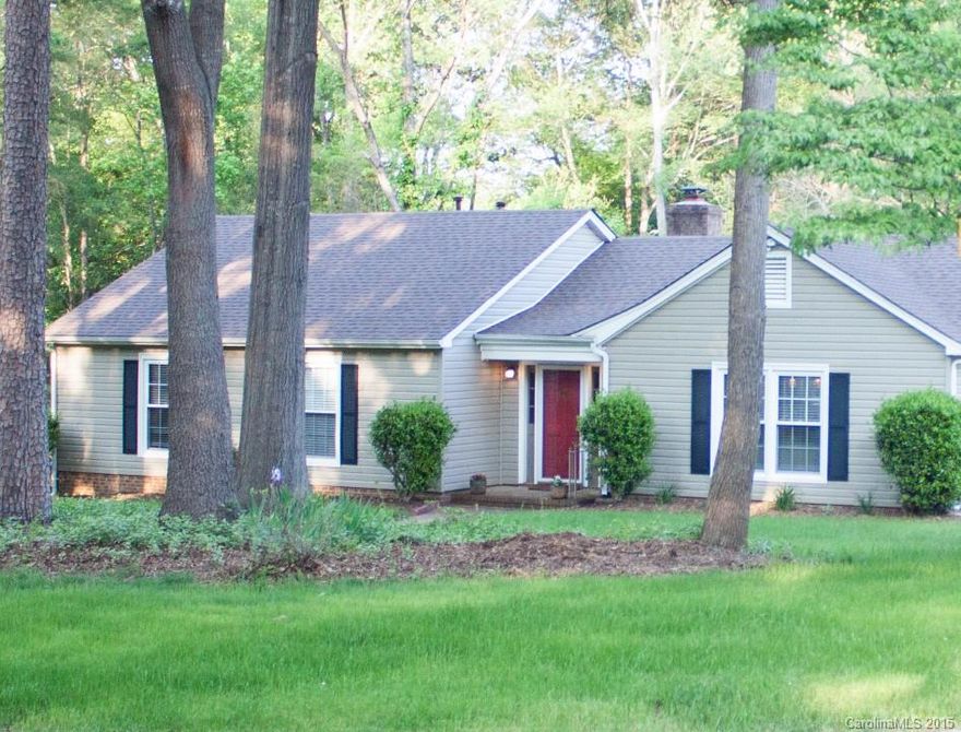 Beautifully updated ranch with large, flat, fully fenced yard and mature trees.  Kitchen features tile back splash, granite counters, and bar-height counter open to living area. Updated baths feature granite, tile and new fixtures.  True en-suite master with double closets.  Backdoor entry from driveway features mud room with laundry.  Roof replaced 2013.