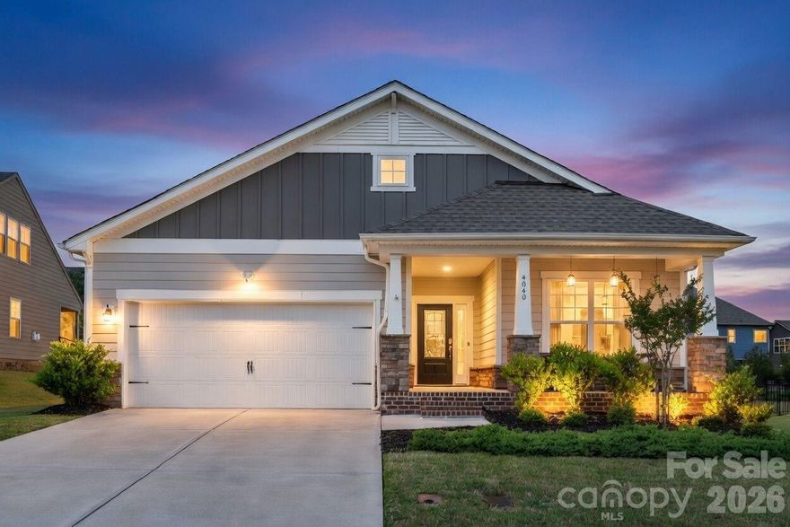 Resort-style living starts here—charming ranch with office, gourmet kitchen, backyard screened in porch, extended patio, fire pit, walkable to secondary amenities in highly sought after MillBridge. 
Beautifully maintained 2-bedroom, 2-bath ranch with dedicated office/study. The Berkshire plan offers an ideal blend of comfort & style. From the inviting front porch—perfect for morning coffee or evening sweet tea—you’re welcomed into a bright, open-concept layout featuring brand new carpet and seamless flow throughout the main living spaces.
The gourmet kitchen is a standout, showcasing white cabinetry, quartz countertops, stainless steel appliances, double ovens, and a gas cooktop—all opening to a spacious family room with a cozy gas fireplace and custom built-in shelving.
A private office with French doors offers flexibility and could easily function as a third bedroom or guest space.
The primary suite provides a relaxing retreat with a well-appointed bath featuring dual vanities. Step outside to enjoy the screened-in porch overlooking a fully fenced backyard, complete with an extended paver patio and dedicated fire pit area—perfect for entertaining or quiet evenings at home.
Additional highlights include a two-car garage and access to top-rated Union County schools.
Enjoy resort-style living in MillBridge, featuring a clubhouse with fitness center, coffee bar, and movie room, plus multiple pools, a lazy river, tennis and pickleball courts, covered basketball court, and a vibrant calendar of community events. Conveniently located just minutes from downtown Waxhaw and a short drive to South Charlotte.