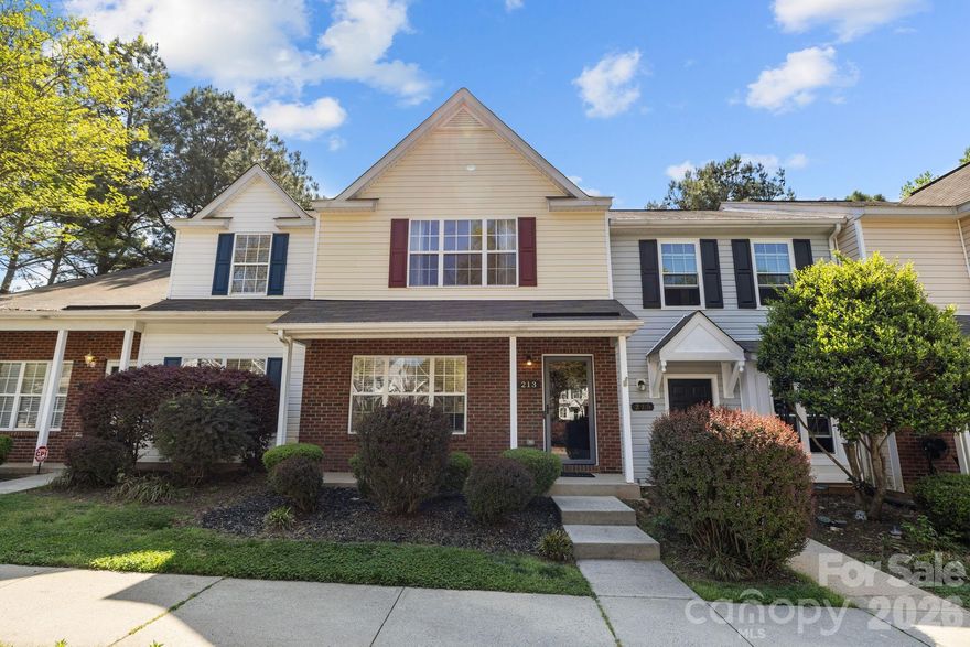 Welcome to 213 Butler Place in Fort Mill — a charming and well-updated townhome offering 2 bedrooms, 2.5 baths, and 1,352 square feet of comfortable living space. The main level features a bright, open layout with a spacious living room anchored by a fireplace, dedicated dining area, convenient half bath, and an updated kitchen complete with stainless steel appliances, stylish two-tone cabinetry, modern backsplash, and center island. Upstairs, you’ll find two generously sized bedrooms, each with access to a full bath, including a primary suite with vaulted ceilings and walk-in closet. Out back, enjoy a private patio space perfect for relaxing or entertaining. Conveniently located in Fort Mill with easy access to shopping, dining, and everyday amenities.
