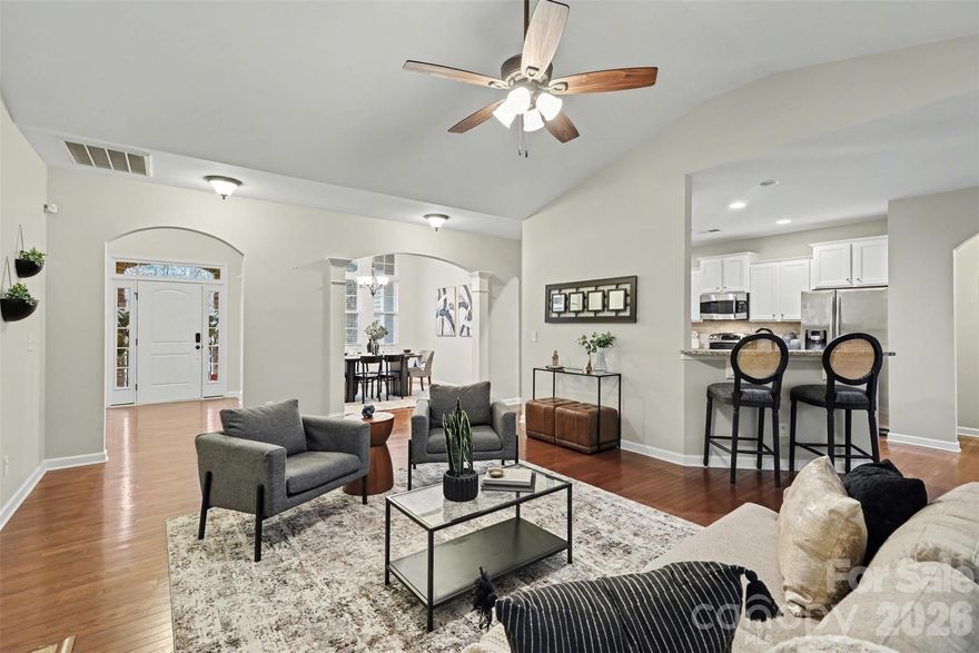 Bright, open, and designed for easy one-level living, this home features a functional floor plan with 10-foot ceilings in select areas, wood flooring throughout the main living spaces, and a wall of windows that fills the home with natural light while showcasing the private backyard. A separate office with French doors provides the perfect work-from-home space.
Step outside to your own backyard retreat with a screened-in porch overlooking a private, tree-lined yard, complete with fencing and an in-ground pool—ideal for relaxing or entertaining.
Tucked away on a quiet cul-de-sac, this home offers peaceful living with everyday conveniences close by—just 1 mile to Starbucks and Chipotle and 4 miles to the Buster Boyd Bridge and Lake Wylie access—and is located within highly rated schools. Comfortable, functional living in a location that makes life easy.