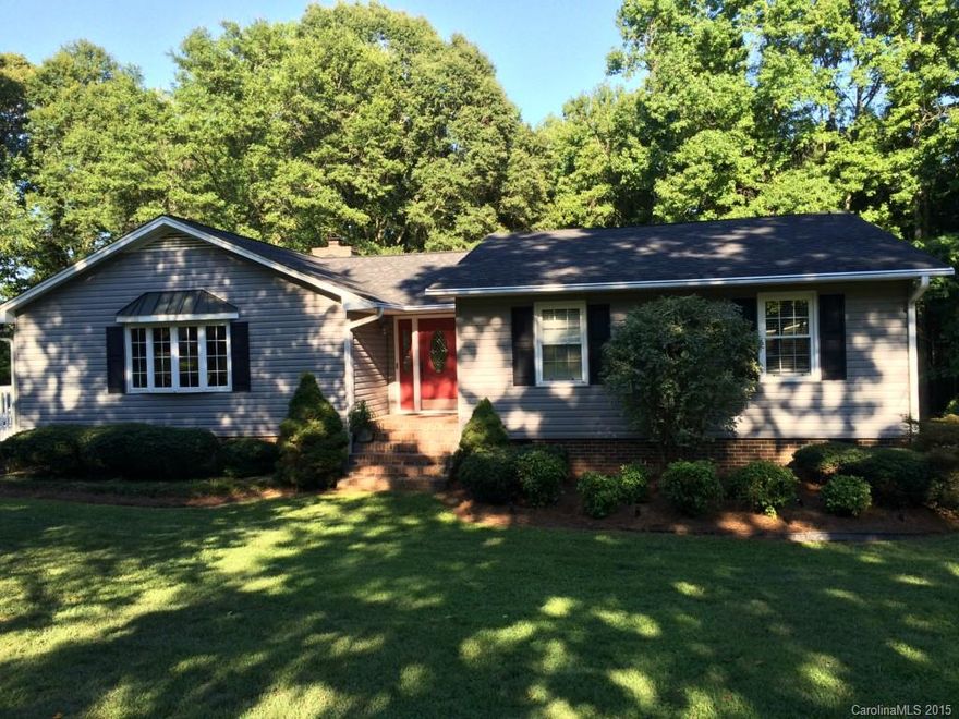 Move in ready!  3 or 4 bedroom ranch home on 1.5 acres.  Replacement windows throughout, large kitchen w/ gas range.  Huge family room w/ stone fireplace.  Remodeled bathrooms.  Large basement that is finished with full bath.  Private screened porch, 2 level deck for entertaining.  Large storage building/workshop.  A must see!