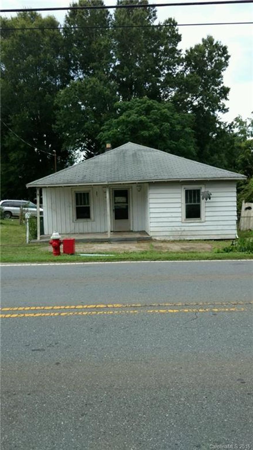 Hardwood floors, fenced back yard. Asking much less than tax value. Sold as-is. Buyer and seller to sign As-Is Addendum attached. Special warranty deed.