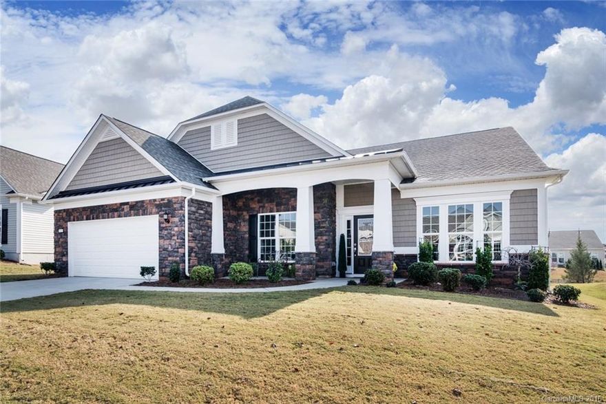 Gorgeous Morningside Lane w/ sunroom, & beautifuly landscaped spacious backyard w/ pergola. Many upgrades throughout: crown molding, tray ceiling, central vacuum, wainscoting, dark hardwoods & more. 
Open great room w/ gas fireplace. Formal dining room or dining nook is the perfect place to host family dinners. Sunroom leads to extended patio. Kitchen showcases SS gas appliances, granite counters, antique white cabinets, tile backsplash, island & walk-in pantry. 55+ Active Adult Community.