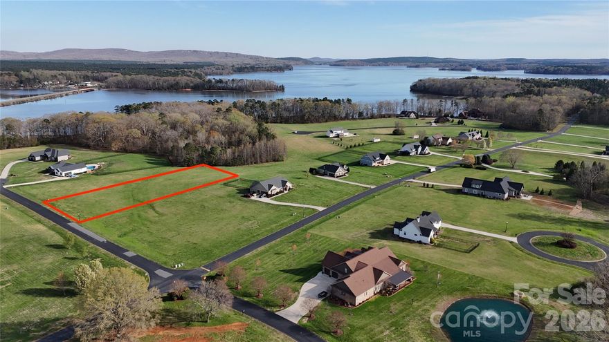 Create your dream home in Yachtsman's Point at High Rock Lake. This cleared, buildable lot offers ideal lake living with access to exceptional community amenities: swimming pool, tennis courts, gazebo, walking trail, and boat ramp at Skip Jack Harbor Marina. Enjoy a well-maintained neighborhood built for relaxation and recreation. Property for sale is owned by Greenstone Homes who will build to your home plans or choose from several plans offered by Greenstone Homes.  Greenstone Homes builds in accordance with Yachtsman's Point homeowners association architect guidelines of a minimum 2,000 square foot.