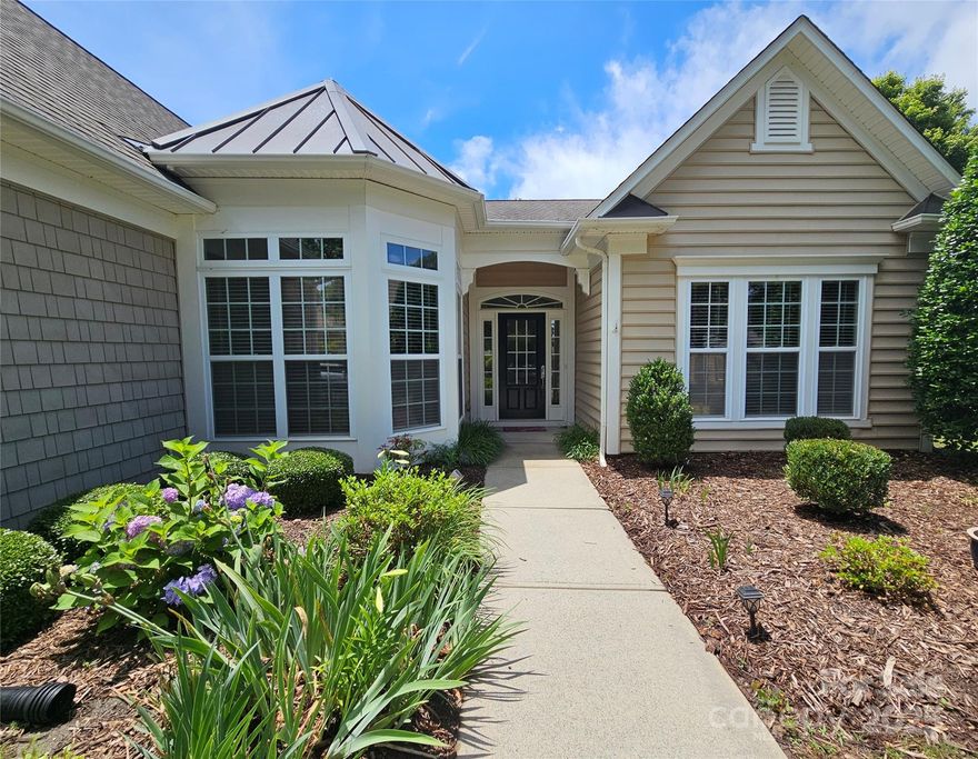 Sought after Cumberland Hall 3BR/2.5BA plan! This lovely one-level home features fresh paint, new carpet, and beautiful new laminate wood floors, all 2025! Water heater(2023), HVAC(2022). This home also has an office w glass doors & a 3-season room. Large windows bring in natural light & the open floor plan includes a kitchen w an island, bar top, pantry, & stainless appliances. The living room has a gas fireplace. A split-bedroom layout offers a private primary suite with a trey ceiling, double vanity, shower, separate tub, linen closet, and large walk-in closet. Two additional bedrooms share a bath. The home backs to the golf course, providing privacy. Enjoy outdoor spaces w a covered front entrance, rear patio, and 3-season room w vinyl windows & AC. The 2-car garage features an insulated door, keypad entry, and pegboards. Active Sun City community offers pools, fitness centers, clubhouses, tennis, pickleball, bocce, trails, clubs & more! Golf memb. avail w discounts for residents.