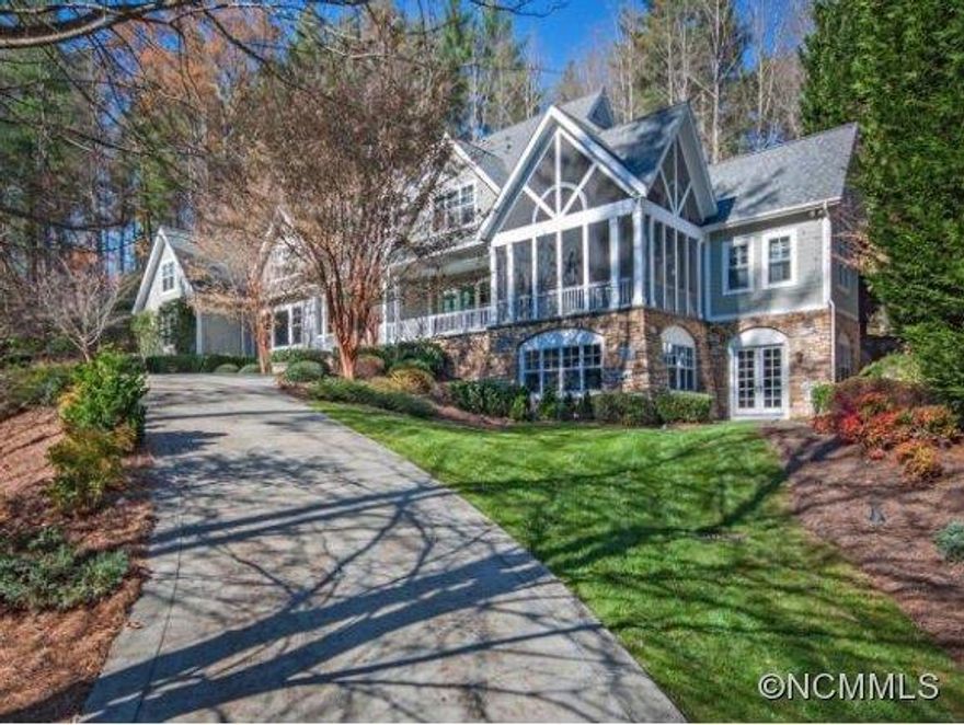 Shingle style and stone home. Light filled, open with views of nature from every room. Spacious rooms, vaulted ceilings, wonderful outdoor entertaining spaces - screened porch. Flowing floor plan, graceful curved staircase, stone fireplaces. Bonus room up, study on main. Game/ big screen room on lower level space for pool table.Close to Carolina Day  and membership Country Club. Extra lot held in conservation easement included PIN 9646-43-7236