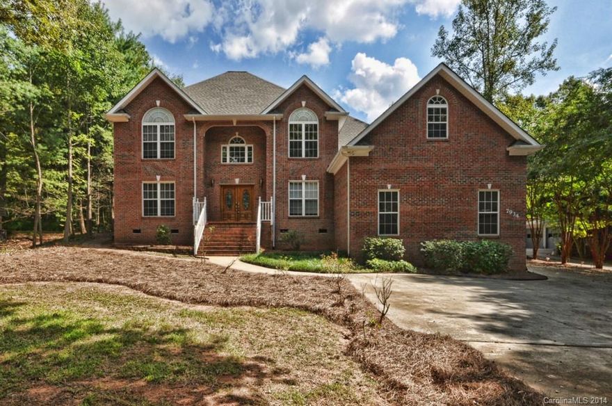 Welcome your new home at Westport Golf Club! Tons of bells & whistles in this beauty - gleaming hdwd floors with lots of inlay (up & down!!), more recessed lights than you can shake a stick at, 9' ceilings on the 1st floor, circular staircase in the foyer, spacious MBR has a tray ceiling with a skylight in it, chair rail, wainscotting...  And that is all besides the fact that you are a stone's throw from the golf course and a hop, skip and a jump from Lake Norman!! Be sure to ask about the pool!