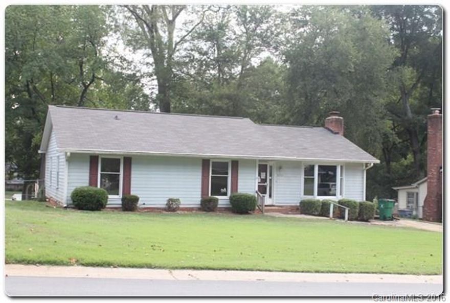 Great ranch home with huge deck in the backyard! Homes features cozy living room with laminate flooring and wood burning fireplace with open floor plan to dining area and kitchen. Backyard is spacious and flat with mature trees to enjoy outdoor activities! Priced below assessed value!