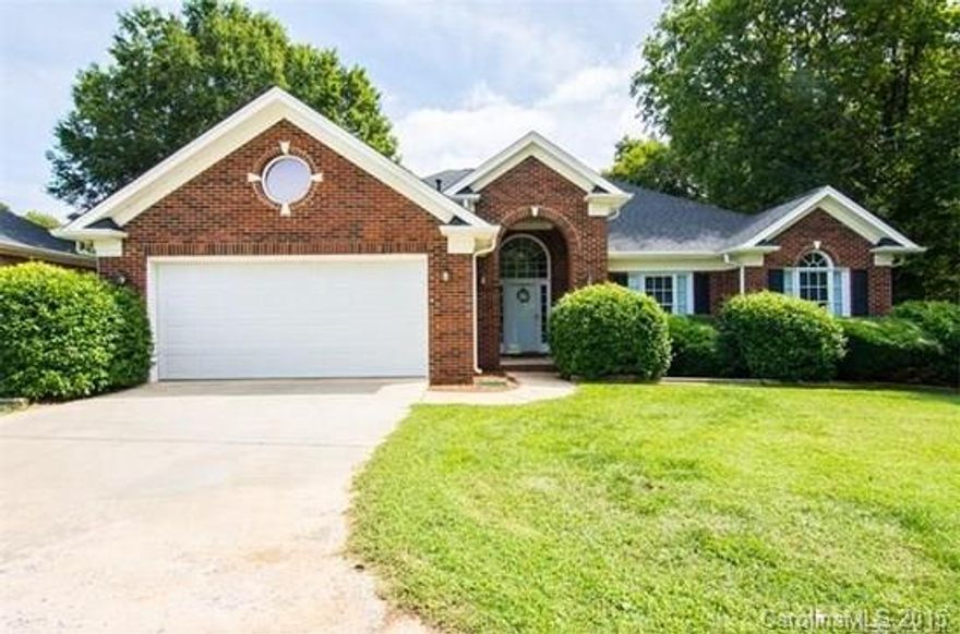 ONE OWNER! Indian Trail address, but located in Village of Wesley Chapel, lower property taxes and NO HOA! Too many extras to list! Immaculate, well maintained, no maintenance full brick exterior, 3 BR, 2 BA, one level home that looks brand new, located on large level lot with 2 car attached garage and circular drive. Features large deck for entertaining. Priced to sell at only $234,900. Super convenient location.  Awesome master suite with garden tub/sep shower.  Washer & gas dryer to remain.
