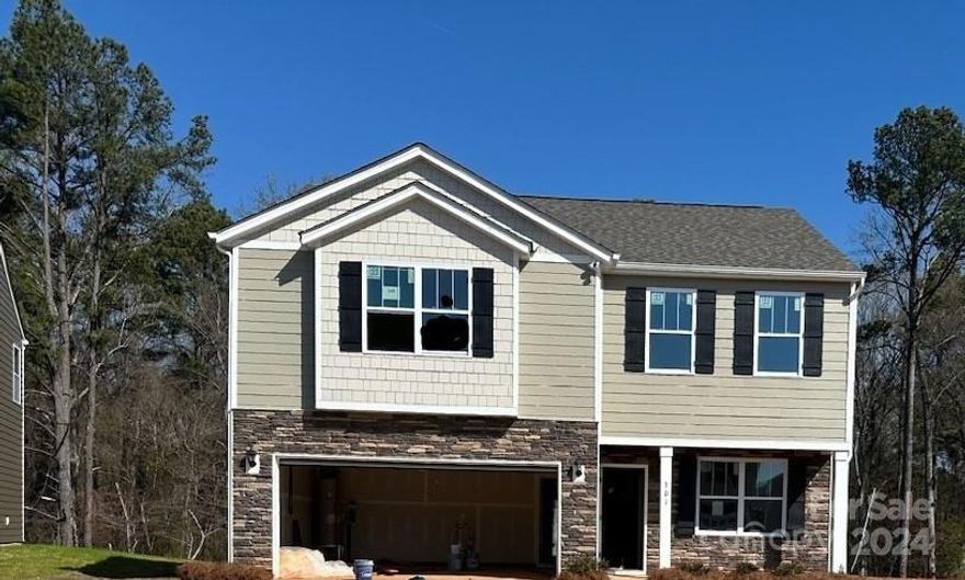 The Penwell is a gorgeous, 2-story home that boasts 3 to 4 bedrooms, 2.5 bathrooms, & 2-car garage. Upon entering the home, you will be greeted with a dedicated office with French doors. The kitchen is open to the great room which is great perfect for entertaining. Enjoy your beautiful kitchen with stainless steel appliances, granite countertops, ample cabinet space, tile backsplash, walk-in pantry and spacious island. Upstairs you will find the large primary suite with walk-in closet, spacious secondary bedrooms with full bath, laundry room and a large loft or 4th bedroom. Community offers pool, cabana, bocce ball, playground and walking trails in sought after location, close to Rock Hill and Fort Mill conveniences.