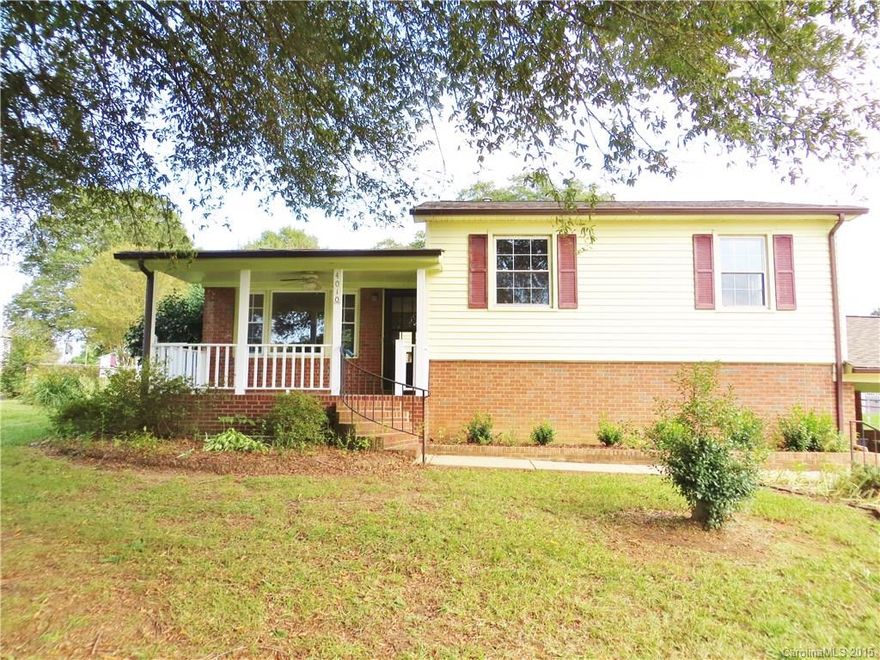 A rare find! Great home with no city taxes and nice 20x40 workshop in fenced back yard. Home has been freshly painted and new carpet! Roof is newer (2011), furnace (2014),replacement windows, and new carpet. Basement offers endless possibilities.  Oversized 2 car carport and large drive. Great rocking chair front porch!