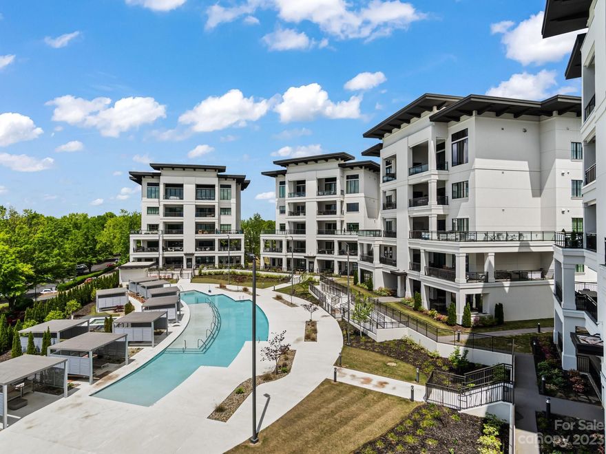 Luxurious resort style living in Lake Norman's prestigious Watermark! Enjoy an elevated low maintenance lifestyle with the finest custom finishes and amenities located in the heart of Cornelius. Secure elevator access opens directly into your unit where you will find nearly 3000 square feet with 3 Bedrooms & 3.5 Bathrooms. Private wrap-around balcony ideal for outdoor entertaining. Primary suite features a secondary balcony, free-standing tub, steam shower and spacious walk-in closet. Designer upgrades with custom window treatments and surround sound throughout the home. Enjoy the finest amenities with resort style pool and spa, gated entrance, cabanas, clubhouse and fitness center. Coming soon, a pickle ball court with new landscaping. Convenient access to shopping, dining and all that Lake Norman has to offer!