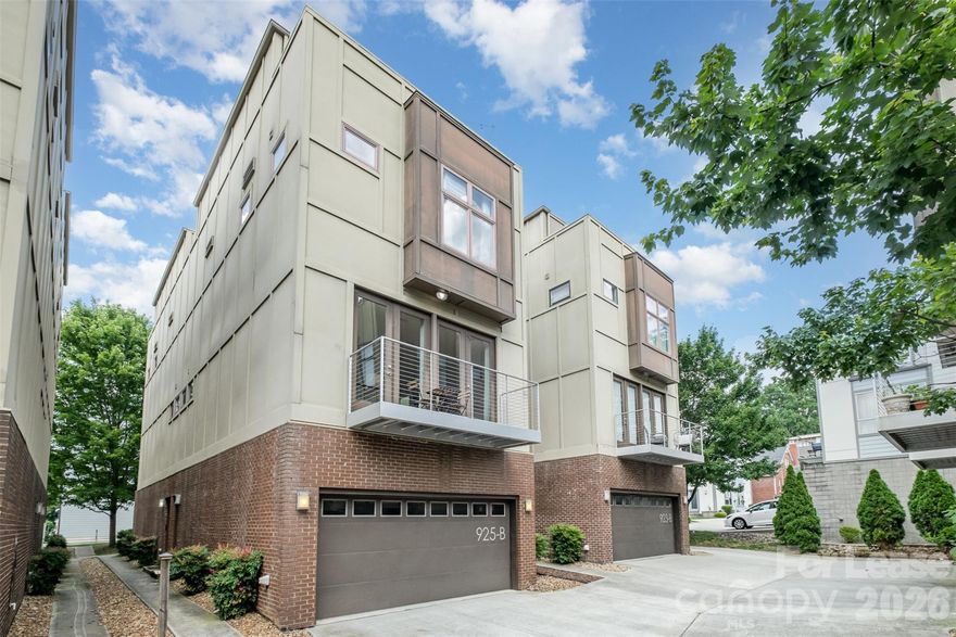 Live in the heart of Uptown Charlotte’s highly sought-after 3rd Ward in this modern, end-unit condo that perfectly blends neighborhood charm with city convenience. Tucked along tree-lined streets yet just steps from Bank of America Stadium, South End, Frazier Park, and all that Uptown has to offer, this home delivers the best of both worlds—walkability, energy, and a true residential feel.

This sleek, thoughtfully designed home features a private rooftop terrace with stunning skyline views.Your own urban oasis ideal for entertaining or unwinding above the city.

The entry level offers a versatile flex space, perfect for a home office, guest room, or gym, with direct access to a private 2-car garage and driveway. The second floor showcases a bright, open-concept layout with a spacious living and dining area, highlighted by two sets of French doors that lead to a private balcony. The modern kitchen is equipped with stainless steel appliances, a gas range, and stylish architectural cable railing accents.

Upstairs, the third level features two generously sized bedroom suites, each with its own full bathroom and walk-in closet, providing comfort and privacy for residents or guests.

With its prime location, functional layout, and elevated finishes, this home offers an unbeatable Uptown lifestyle.