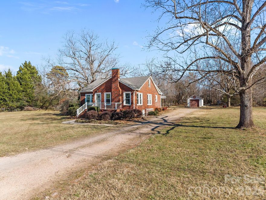 New LOWER Price! Motivated Sellers! Beautifully Updated Brick Home on 1.20 Acres Between China Grove & Landis. Perfectly positioned between China Grove and Landis (NO CITY TAX), this charming 1.5-story brick home sits on a peaceful 1.20-acre lot, offering space, privacy, and thoughtful updates throughout.  The updated kitchen is both stylish and functional with granite countertops, tile backsplash, stainless steel appliances, and ample cabinet space flows seamlessly into the dedicated dining room and bright and airy living room. This home offers 3 bedrooms and 2 full bathrooms, including a stunning primary suite with a spa-like bath featuring a large double sink vanity, a walk-in tiled shower, and a relaxing soaker tub. Both bathrooms have been tastefully updated with modern finishes and tile flooring.
The upper-level room provides flexible space—perfect for a bedroom, office, playroom, or media room.
Outside offers plenty of room for vehicles, equipment, or hobbies. The fenced backyard provides ample space for outdoor entertaining and gardening. 
A rare combination of acreage, updates, and location—this home delivers country-style living with easy access to nearby towns, schools, and commuting routes.