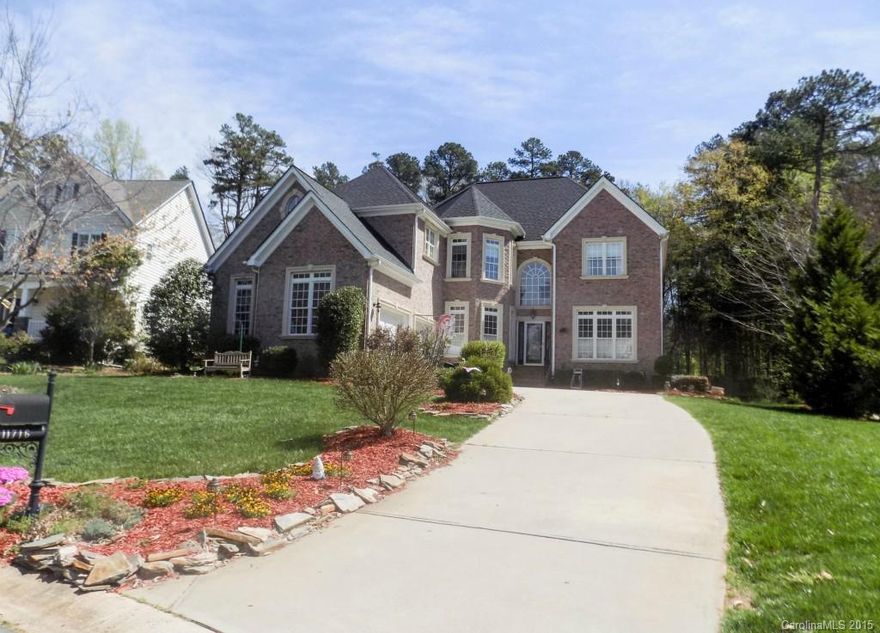 An incredible custom built home.  Elegant features and flow to the house.  The arch ways add wonderful character along with the large curved wall in the living room. Granite counter tops, hardwood floors, beautiful master suite, bonus room with the curved wall and views of the perfect back yard.  The covered deck, Koi fish  pond, patio area and landscaping make for the perfect peaceful escape.