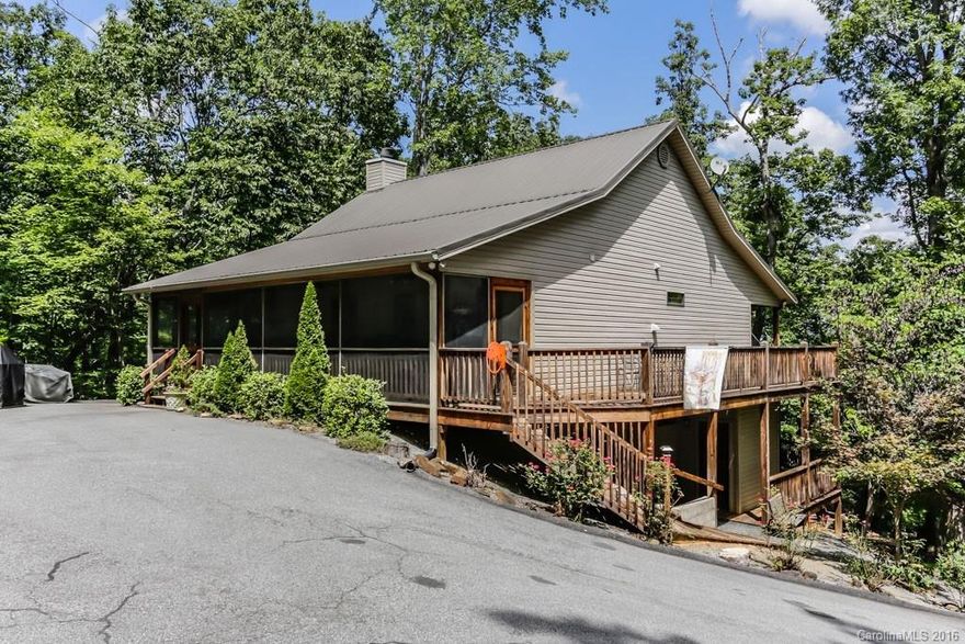 YOU WANT PRIVACY WITH MOUNTAIN VIEWS.............HERE IT IS! 2000 sq ft, 4 bedroom home on nearly 10 acres, just outside Lake Lure! You'll enjoy total peace and quiet from the multiple covered porches and decks surrounding this lovely rustic, mountain home.