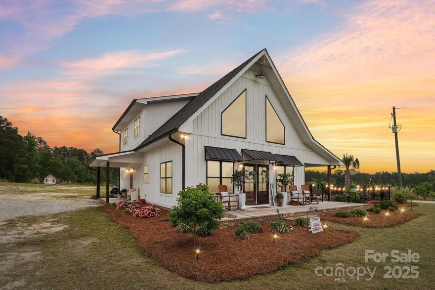 A Dream Farmhouse on Nearly 30 Acres! 
Nestled in the heart of the countryside, this custom-built 2022 farmhouse offers 1,800 square feet of pure charm and luxury. From the moment you step inside, you’ll be captivated by the warmth of the tongue and groove ceilings, the elegance of sliding barn doors, and the beauty of granite countertops paired with a brick backsplash. The cozy brick fireplace with gas logs invites you to unwind, while the spacious master ensuite features a private tiled shower, double vanity, and a walk-in closet that adds both comfort and convenience.  The kitchen boasts custom cabinetry and a walk-in pantry, making it as functional as it is beautiful. Just beyond, a screened porch overlooks a sparkling inground pool, fully fenced for privacy, with a newly built gazebo offering the perfect spot for quiet mornings or evening gatherings. Property includes multiple natural springs that offer the perfect opportunity for a future pond!  Professional pictures coming soon