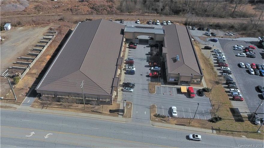 Ideally situated approximately 4 miles from I-26, and just minutes from downtown Hendersonville, 2560 Asheville Highway is an investment opportunity on a four lane commercial corridor providing both location and excellent condition. This 8 Suite Shopping Center is For Sale. Built in 2010, in excellent shape, and with easy access, this property is in the right spot for for a commercial rental investment in a growing city.   Six suites have tenants in place. The largest suite is 14,570 SF, and the remaining are either 2,150 SF or 2,400 SF. All suites have plenty of windows. 89 parking spaces allow room for everyone, and the daily traffic count of 25,000/ day is a reminder that this shopping center’s highly visible shared monument signage is seen by many potential lessees and consumers.