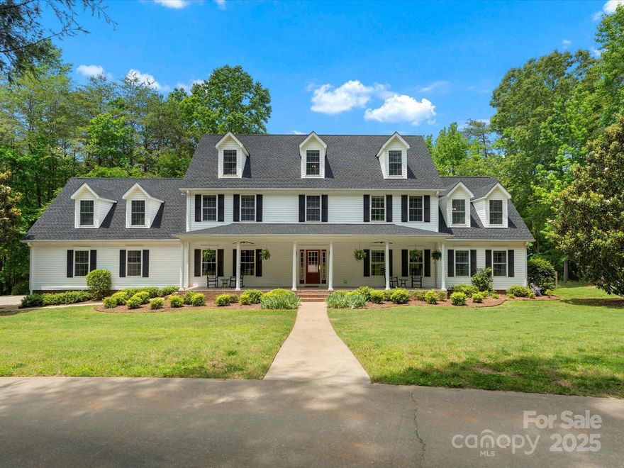 Welcome home to 1010 Arabian Farm Road this stunning 4800+hsf home is nestled in on a gorgeous 4+ acre private lot with a pond and a dock!  This peaceful retreat has so much to offer you can enjoy spacious rooms, inviting porches, scenic views, meticulously manicured grounds, the serenity of Clover's countryside and so much more! Across the threshold the sunlight spills through the picturesque windows in every room. Gorgeous oak hardwood floors line the main living areas and tile in the wet areas. Prepare your favorite meals in the kitchen crafted for a culinary artist and serve them up in the formal dining room! Get cozy in the expansive great room or retreat to the primary retreat located on the main level. Upstairs on the 2nd and 3rd floors you will find 5 more rooms that can serve as bedrooms, a loft area, massive bonus room and office area! All located in the award winning Clover School district! This one is like no other and won't last long!