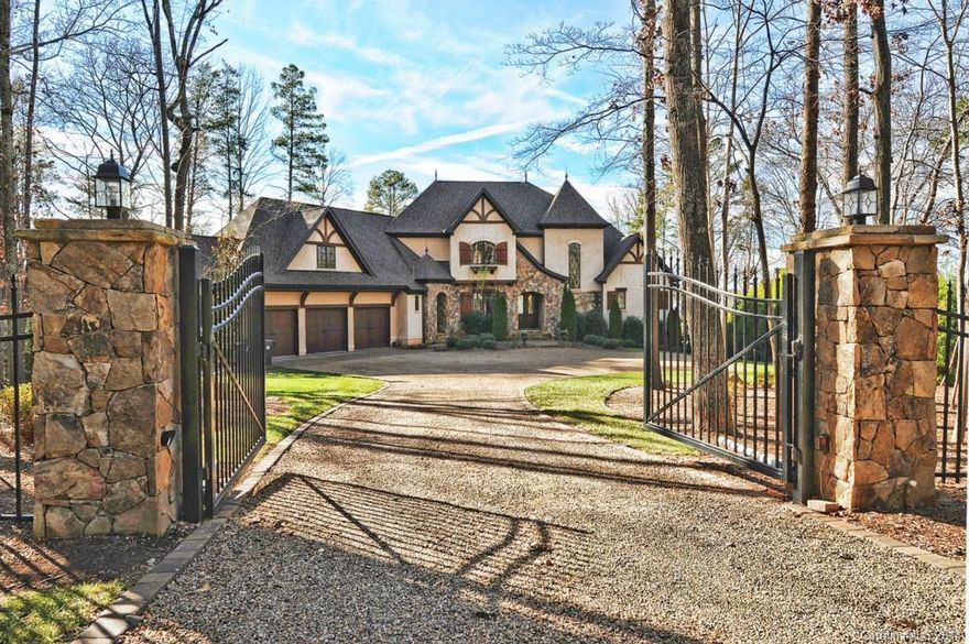 Unbelievable, waterfront estate w/amazing sunset & main channel views. Incredible views from all lakeside windows! Open flrplan w/distressed, wide-plank cherry flring, stone fps, cedar beams & lovely curved staircase. Gorgeous KT w/huge center island, granite tops, Thermador SS appls & Subzero frig. Bsmt w/media, billiards, fitness, bar/partial KT w/serving windows to pool! Brand new custom designed salt water pool & spa-lrg fire pit & blt-in grill, newly reblt covered dock..see agent remarks