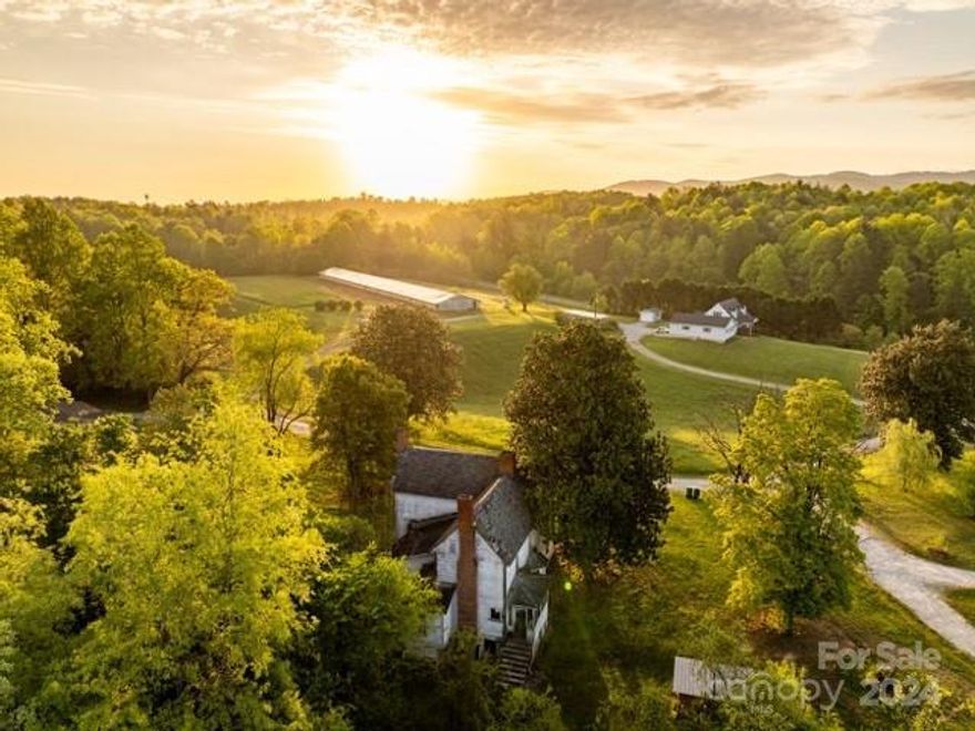 RARE FIND: Big Warrior Creek runs thru it… Horse Farm or other livestock will welcome these 150 acres +- of open land along with growing timber. This Beautiful, Serene Farm IS the American Dream. Mountain views, 2 move-in ready residences, each with their own well and septic. Numerous building sites for the entire family to enjoy building their own… Large building with plenty of room for hay and horse stalls. Numerous outbuildings. Old 1800’s Farm House takes you back in time. Conveniently located near the Moravian Falls area
 "The American Dream Lives Here"