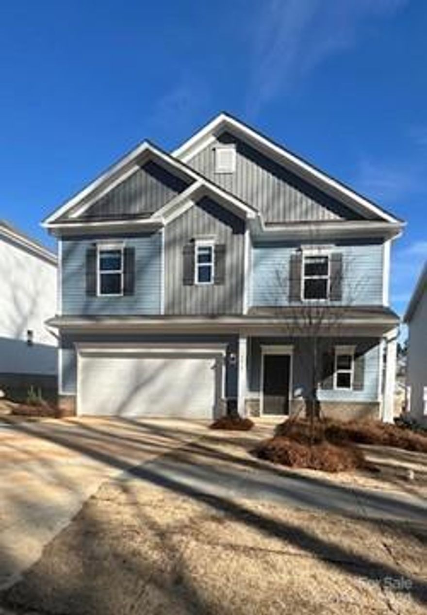 Near Uptown Charlotte, Wilora Pond presents the Benson II featuring a 4 bedroom, 2.5 bath open concept floor plan efficiently designed just for you. The wide entry foyer guides you effortlessly to the spacious family room, breakfast area, and kitchen. The Kitchen boasts a drop-in sink in the center island, stylish pendant lighting, electric stainless steel appliances, Granite counter tops, 36" Gray cabinets decorated with crown molding, tile back splash, and a pantry. The second-floor spacious owner's suite is tucked away with a private owner's bath including dual vanities, a large shower and massive walk-in closet. Also on the second level you will find three additional bedrooms, a full bath and a laundry room. Live in style at Wilora Pond this Spring! Relax on the covered front porch or take advantage of you covered back patio.