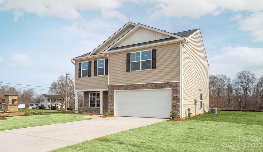 Hickory Ridge Estates is a new waterside community located across from beautiful High Rock Lake, where you can enjoy fishing and boating. The Penwell features an office on main floor, an open kitchen with an island with granite countertops and room for 4 bar stools also stainless-steel appliances, open dining, and great room for entertaining. Upstairs features a Primary suite with large 5' shower in bath with double vanity and linen closet and there is an upstairs laundry room for ease. Hall bath with double quartz sinks upstairs & 2 additional bedrooms and a super loft area. One-year builder & 10-year structural warranty included. Includes Smart Home technology package! Equipped with technology that includes the following: a Z-Wave programmable thermostat, a Z-Wave door lock, a Z-Wave wireless switch, a touchscreen Smart Home control panel, an automation platform from Alarm; and a SkyBell video doorbell.