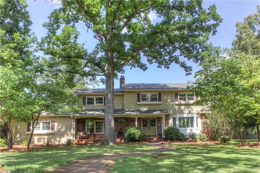 Gorgeous two-story home nestled on a wooded, private corner lot. Home is situated on .86 acres and is the only house currently available for sale in Hutchinson Place! Enjoy sipping tea on the huge front porch, sitting by the fire, reading a book in the sun room, or taking a dip in the pool that is perfect for entertaining! This house has it all and that is just the downstairs! Come see your new home before it's gone! House even has a 1/2 bath in the heated garage for the pool!