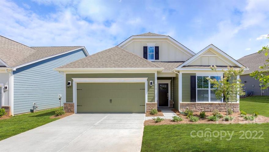 This Arlington floor plan presents cottage living in the most appealing way! Smaller square footage with all the interior spaces dedicated to living large. Formal entry with wainscoting and crown molding, guest bedroom and bath at the front of the home while owners suite rests in the rear.  Kitchen layout has island, pantry, tile backsplash, granite counters and stainless steel appliances: gas range, micro over, dishwasher, disposal. Dining area has screen porch access. Revwood flooring for easy maintenance. Living room with fireplace, vented gas logs, and ceiling fan.  Laundry is a step away from the garage entry and small office (or storage or hobby) next door to the laundry. Owners suite has ceiling fan, bath with tile shower surround, dual sinks, higher vanities, and comfort height toilet with privacy door.Walk-in closet with ample space for "most"! Two car garage, garage door opener included.Clubhouse to be built with pool, fitness area, and playground.
Home is UNDER CONSTRUCTION