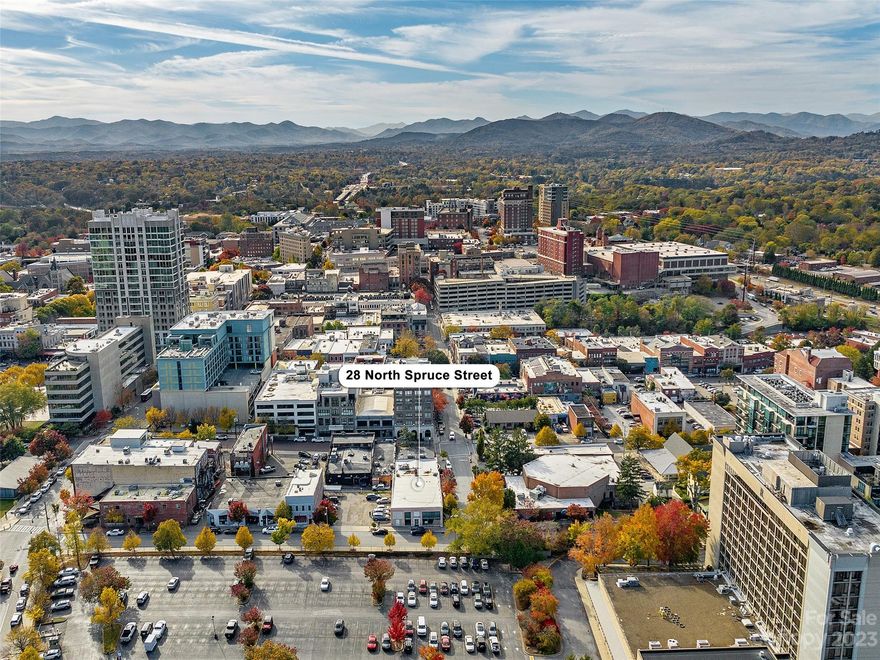 For Sale: distinguished cornerstone of Downtown Asheville, this iconic property stands where the revered
Hunter and Coggins Clothing shop once served the community. Robust brick and steel construction, this
commercial jewel offers expansive levels of prime urban space, including a remarkable second floor
accessible by a unique drive-up ramp—practical as it is impressive. Nestled in the vibrant heart of
Asheville, advantageous CBD Zoning, and Hotel Overlay-District B (exclusively for boutique
accommodations), this property is a canvas for visionaries. Envision a chic boutique hotel, a bustling office
space, or a trendy restaurant or retail hub—this versatile locale invites many entrepreneurial possibilities.