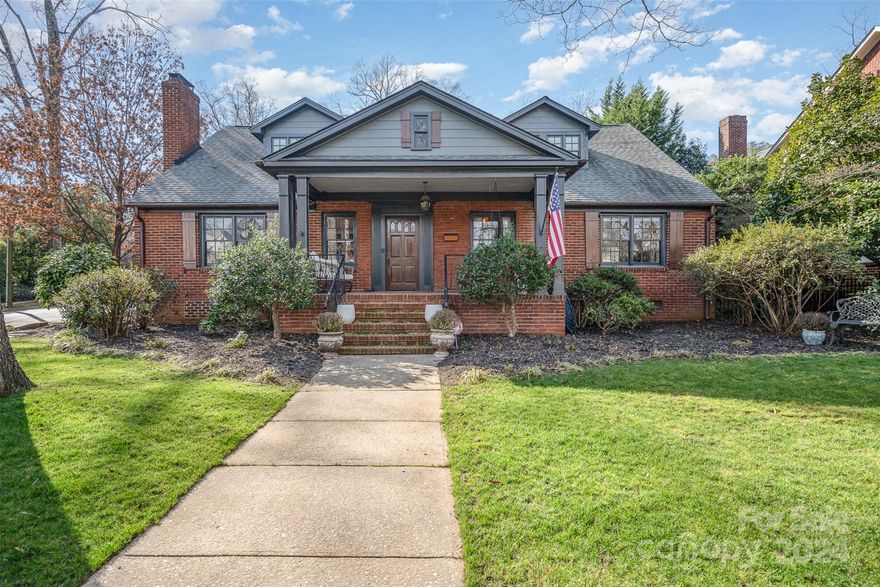 If you've been waiting for the perfect Dilworth Historic District home, you have found the one!  Originally the home to Charles Moretz of Charlotte staple Moretz Coal & Ice Co., this home was featured on the 2008 Dilworth Home Tour after extensive renovations.  Perfectly situated on a large corner lot less than one mile from Uptown Charlotte with full views of the city skyline, this unassuming home now boasts almost 4700sf with 5BRs + office, 5BAs, large, finished basement, original hardwoods throughout main house, whole house generator system and heated tile floors in sunroom & primary bath. The oversized chef's kitchen includes a 12' eat-in island, 48" gas range & pot filler, dual dishwashers, 48" fridge/freezer, cast iron farm sink with marble surround tops, wet bar w/separate sink, wine cooler, and pellet ice maker!  The large owner's suite features high vaulted ceilings, spa bath with vessel tub & marble shower, private WC and spacious walk-in closet!  Tons of storage and space!