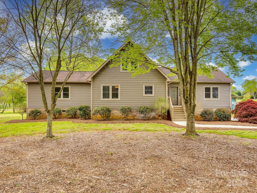 Inspected & Repaired! Stunning 3BR/2.5 bath basement home nestled on a level 1.07 acres with several recent (5/2022) BIG ticket improvements: exterior cement fiber siding-just under 32k (it's JamesHardie), new concrete driveway/sidewalk 23k and a fresh pad of concrete in the walk-in crawl space & new gas water heater. Fun for all with the Stilz elevator (16k)-this takes you effortlessly from basement/garage to the main level! Equally enjoyable, the spiral staircase to the quaint loft area that overlooks the vaulted GR. Newly refinished on-site wood floors & recently painted interior walls. The gorgeous tongue & groove vaulted ceilings and wood-burning fireplace mimic the Chalet style homes found in the Swiss Alps. The open kitchen concept has been updated with granite counters, the refrigerator conveys. Split BR floor plan. The unfinished (nearly 1500 SqFt) basement, with 1/2 bath,  tremendous potential! Quick & easy commute to I-77. Fort Mill schools!