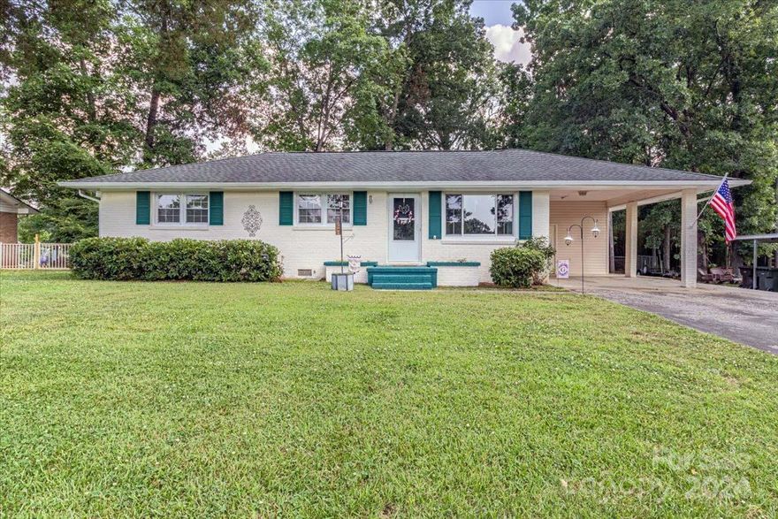 Welcome to 2048 Montclair Drive in Rock Hill's Midbrook Subdivision! This charming brick ranch features 4 bedrooms and 2.5 bathrooms, including a spacious, updated owner's suite with a sitting area and back deck access. The open-concept living, dining, and kitchen area is perfect for family gatherings. Step outside to a large, flat, fenced backyard with a 12,000-gallon 52x24' above-ground pool, ideal for summer fun. The property backs up to Oakwood Acres Park, a 10-acre haven with baseball/softball fields, basketball courts, a playground, and a shelter. Enjoy the freedom of no HOA.