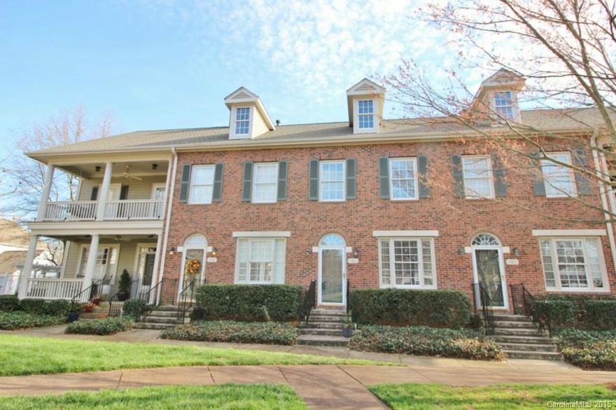 Charming abounds in this townhome overlooking the green in popular Baxter Village. Hardwoods on main floor, tile floor in full baths,kitchen with granite counter tops and tile backsplash. Cozy patio with swing and pergola - great for relaxing or entertaining! Amazing Location- Close to I-77, shopping, restaurants, YMCA, schools and steps away from the pool!