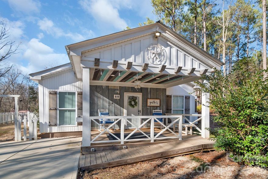 Enjoy privacy, space, and flexibility with this 2-bedroom, 2-bath home situated on 2.15 acres in a prime location with no HOA, featuring a desirable split-bedroom floor plan.

As you enter the home, you are welcomed by a generously sized bedroom, followed by an additional flex room—perfect for a home office, craft room, playroom, or bonus space to fit your needs. A full bathroom is conveniently located nearby and leads seamlessly into the heart of the home: a large open living area, a spacious living room with cathedral ceiling, and a dining area that flows effortlessly into the kitchen—ideal for everyday living and entertaining.

Just off the kitchen, you’ll find a laundry room that connects to a large walk-in closet, offering excellent storage and the option to use it as a pantry or additional primary closet. Off the living room and closet is the primary bedroom, complete with an ensuite bathroom featuring a walk-in shower, tub, and a generous walk-in closet.

Step outside from the kitchen onto a screened-in porch, perfectly nestled along the side of the home for relaxing and enjoying the peaceful surroundings. The property also includes a large detached outbuilding with power and its own subpanel, plus a second-level storage area. Two additional outbuildings/sheds provide endless possibilities—workshop, storage, home office, or future guest or granny pod conversion.

Conveniently located near US-521 / Hwy 9, shopping, dining, University of South Carolina Lancaster, and MUSC Health Lancaster Medical Center, this property offers the perfect blend of space, flexibility, and accessibility.