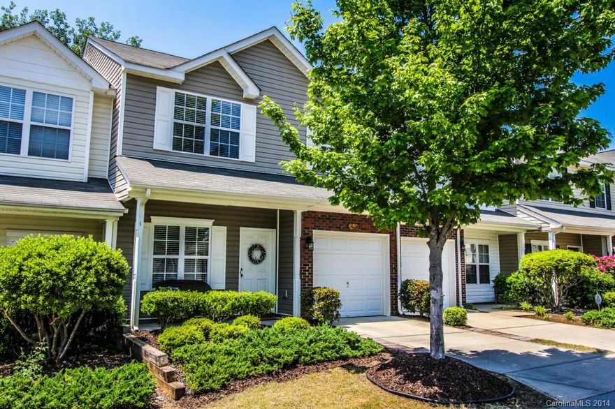 Wow, best unit in the complex, better than new!  Updated fixtures, new paint and carpet in 2013 plus a wooded and private backyard. Large kitchen with 42 inch cabinetry, open kitchen/living room great for entertaining, new roof in 2011 and more.  2 bedrooms, a loft and a third private room that would make a great office or nursery. Great Fort Mill Location.  Must see.