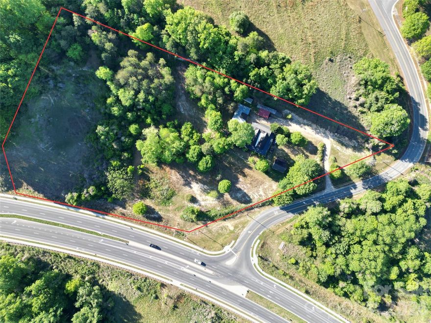 Excellent opportunity for builders and investors to acquire approximately 6.59 acres in a growing area of Kannapolis. This property offers substantial road frontage along Bethpage Road and Mooresville Rd and is well-positioned for residential development.

Currently zoned R-8 (Medium Density Residential), which allows for up to 8 units per acre (subject to city approval).  This opens up the potential for a variety of residential uses including single-family homes, duplexes, and townhomes. The acreage and layout provide flexibility for subdivision or small community development. R8 zoning allows for commercial uses in certain situations pending approval from the city.

Public water and sewer (buyer to verify with the City of Kannapolis). Power is available along the road frontage. Surrounding properties show active residential growth, with new construction and redevelopment occurring throughout the area.

Conveniently located near revitalized downtown Kannapolis, shopping, dining, and major roadways, this property is positioned in a corridor experiencing continued expansion and demand.  Opportunities of this size and zoning flexibility are becoming increasingly limited in this submarket. Whether you’re planning a small subdivision, townhome community, or long-term land hold, this property offers a strategic position in a corridor where growth, density, and demand are aligning.