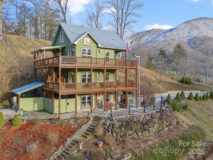 MOTIVATED SELLER! Set within a private, gated mountain community defined by over 500 acres of preserved land, this exceptional property offers a rare blend of natural beauty, thoughtful amenities, and refined mountain living. Residents enjoy access to Big Rock Creek with pristine trout fishing, a tranquil pond, winding streams, scenic walking trails, and shared gathering spaces that foster a true sense of community. Equestrian charm abounds with horses, goats, a community barn, and open pastureland that enhance the pastoral atmosphere while maintaining privacy and serenity. The home itself is perfectly positioned to capture sweeping, long range mountain views and an abundance of natural light throughout the day and designed for individuals desiring multi level living. A circular driveway provides a welcoming arrival and convenient access, while an exterior elevator effortlessly connects the driveway to the upper living level s. Inside, the upper level is anchored by a dramatic living room with a vaulted ceiling and a stunn ing floor to ceiling, see through stone fireplace that creates a warm focal point shared with the dining area ideal for both intimate evenings and memorable gatherings. Three well appointed bedrooms and two full baths are located on the main level, along w ith a conveniently placed laundry area. The ground level expands the home s versatility with a cozy den, a full bath, and a drive through garage that adds both functionality and ease, perfect for vehicles, hobbies, or mountain gear. Above, a charming third level loft offers flexible space for a studio, office, or retreat, overlooking the living areas below while maintaining a sense of openness. Outdoors, a newer stone retaining wall complements the natural landscape, blending durability with timeless mounta in character. Every element of this property has been designed to harmonize with its surroundings, offering privacy, convenience, and a deep connection to nature. From peaceful mornings overlooking the mountains to afternoons exploring the trails and eveni ngs gathered by the fire, this home delivers a lifestyle that is as enriching as it is serene where community, comfort, and breathtaking scenery come together in perfect balance. MOTIVATED SELLER!