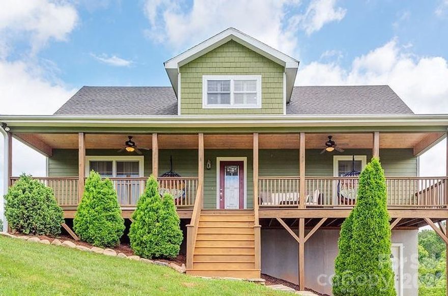 Welcome to 216 Reilly Drive in Leicester, offering year-round mountain views in a peaceful setting on the outskirts of Asheville. Situated on 1.15 acres, this Arts & Crafts-style home combines a peaceful, rural feel with everyday convenience.

The home features a well-designed layout with nearly 2,000 square feet above grade, plus a partially finished basement for added flexibility. The main level includes a comfortable living room with a gas fireplace, a functional kitchen with a breakfast bar and pantry, and access to covered porches and a deck—ideal for enjoying the mountain views.

With 3 bedrooms and 3 full baths, including a private upper-level primary suite, the home offers space for both everyday living and guests. The lower level provides additional finished areas including a rec room, bonus room, and full bath, creating options for work, hobbies, or extended living space.

Step outside to enjoy the surrounding natural beauty, with a spacious yard that offers room to garden, relax, or gather with friends and family within the Red Oak Plantation community.

Short-term rentals have been allowed in the community, and the home has a history of long-term rental use, making this a versatile option for a primary residence, second home, or investment property.