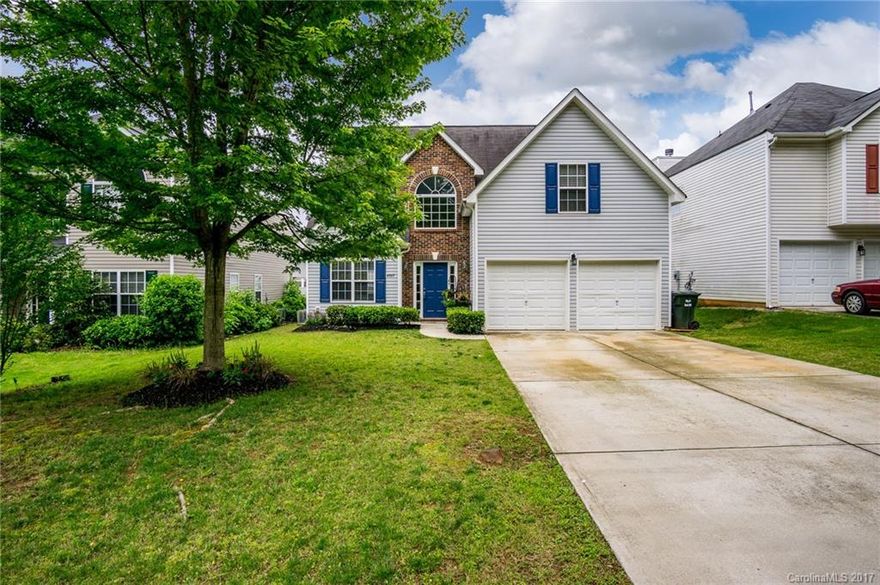 Make this move in ready home yours! The open floor plan encompasses 4 spacious bedrooms & 2.5 bathrooms with plenty of room for entertaining or relaxing. A sleek kitchen with granite counter-tops flows through to the dining area.  The expansive living room with fireplace opens to a spacious rear patio, well-manicured lawn & fenced backyard. The master bedroom on the main, complete with walk-in closet & en-suite, ensures a private space to relax. Convenient to I-77 and great schools.