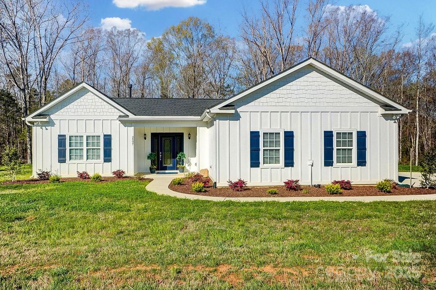 Better than new! Experience the perfect blend of modern luxury and peaceful surroundings in this better-than-new, custom-built home, completed in 2022. Located on the north side of Lancaster, this property sits on almost an acre, offering wooded views and plenty of space—ideal for a future pool or outdoor entertaining. A newly installed sprinkler system and upgraded well pump will help make lawn care a breeze! Designed with quality and style in mind, this home features upgraded finishes throughout, including quartz countertops, a large pantry, and a cozy fireplace in the open-concept living space. The screened porch is the perfect spot to relax while taking in the peaceful wooded backdrop. A spacious garage provides ample storage and convenience. Why wait for new construction when you can move right into this thoughtfully designed, custom home? Schedule your showing today!