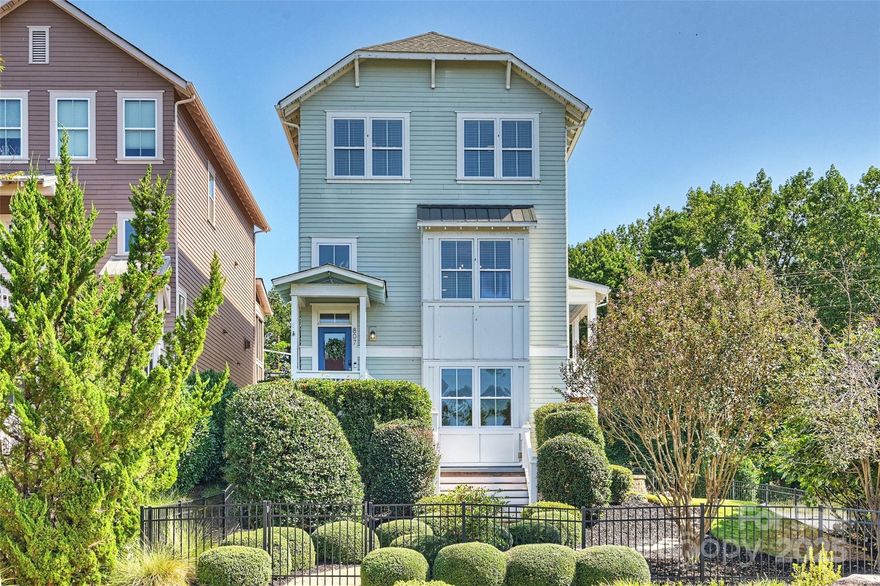 Riverfront living at its best in the sought-after Riverwalk community. Welcome to your new home along the Catawba River. Perfectly positioned on a corner lot for added privacy, this Saussy Burbank Charleston-style home offers gorgeous year-round views of the river, especially in the winter, and easy access to all the lifestyle amenities Riverwalk is known for. Step inside to find a bright, open floor plan filled with natural light from oversized windows, high ceilings, and timeless details. The main level offers multiple spaces for entertaining, including a cozy great room with a fireplace, a front flex room that can serve as a home office, dining, or sitting area, and a chef’s kitchen ready for gatherings. The lower level features a private 4th bedroom (currently used as a media room), full bath, and drop zone off the garage, an ideal setup for guests or a quiet retreat. Upstairs, the spacious primary suite includes an en-suite bath with tiled shower, and a large walk-in closet with a custom system, plus additional bedrooms and a convenient laundry. Outdoor living is a dream with a 2nd-floor wraparound deck and a lower back porch where you can relax and enjoy. Living in Riverwalk means more than just a beautiful home; it’s a lifestyle. Stroll to the town center for dining, shopping, or coffee, or hop on the 3+ miles of walking/biking trails that wind along the river. Spend summer days tubing the Catawba, watch the action at the BMX Supercross Track, or enjoy laps around the Velodrome, all just minutes from your doorstep. Additional highlights include fresh carpet in bedrooms, a whole-house water filtration system added in 2023, and new Trex decking on the front porch and stairs in 2024. Check out the Matterport 3D tour on Homes.com