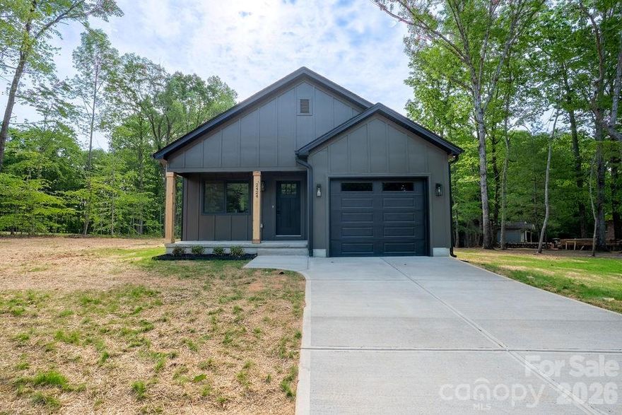 Brand new construction on over an acre of land! Single story sprawling ranch boasts 3 bedrooms and 2 full baths with an attached garage! Open concept living area, cathedral ceiling in family room, tray ceilings in master bedroom, recessed lighting throughout, and beautiful view from the rear porch. Upgraded trim package and black matte light fixtures. Soft-close white shaker cabinets and quartz counters with eat-in kitchen. Great location with plenty of privacy but easy access to shopping and freeways. This is a must see!