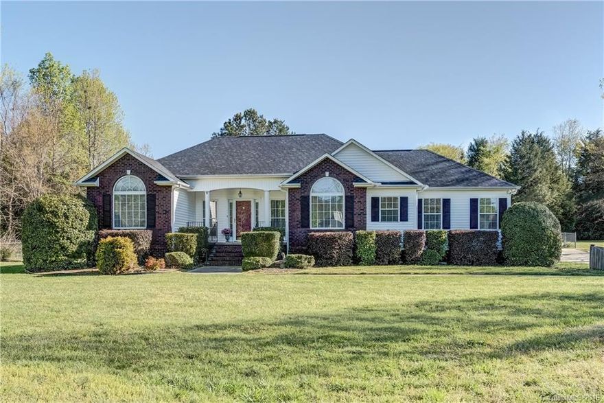 Beautiful one-story on acre in sought after Clover Schools. Great community with large lots and NO HOA! Three beds and two baths with breakfast bar and eat-in kitchen. Enormous deck for entertaining, large fire pit, and outdoor building without roll-up door as well. True hardwoods, granite, and undermount sink with gorgeous tile trim work in kitchen. Tray ceilings in master with separate shower and tub with tile details. This one will not last long!