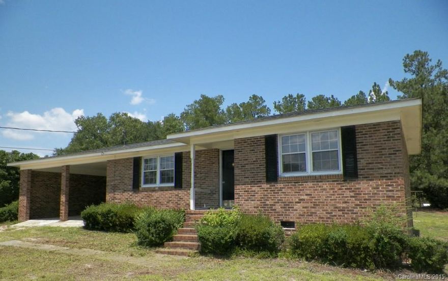 Make this ranch house located on almost an acre a home with some renovation/update ideas.  It features an eat in kitchen, living room, two bedrooms, one bath and bonus/playroom.